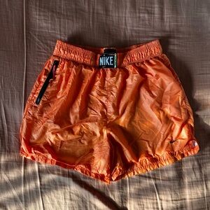 orange nike shorts